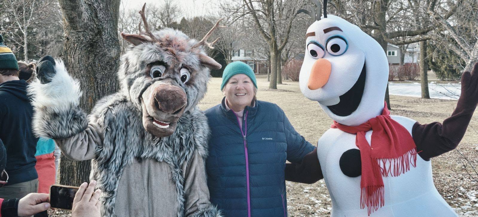 Christine Symchych speaking with neighbors downtown